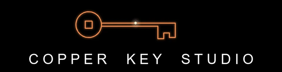 The Copper Key Studio logo: a glowing copper key above the studio name